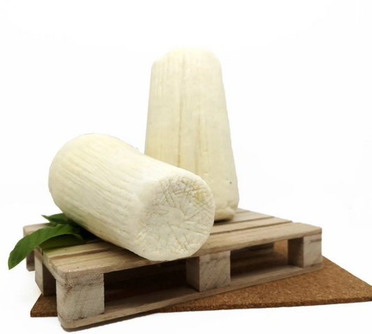 Ricotta Sarda Stagionata 3 kg on a wooden pallet with a fresh herb decoration.