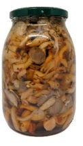 Funghi Chiodini in Olio di semi di Girasole in a glass jar, featuring assorted mushrooms preserved in oil.