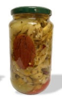 Antipasto di Calabria in Olio di semi di Girasole in a jar with assorted vegetables and spices.
