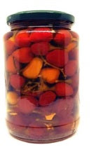 Peperoncini Piccanti Rotondi in Olio di semi di Girasole, 1 kg jar with colorful chili peppers.