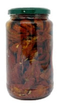 Pomodori Secchi in Olio: jar of sun-dried tomatoes in sunflower oil, ideal for enhancing dishes.