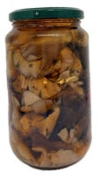 Funghi alla Boscaiola in Olio di semi di Girasole 1 kg in a glass jar with mixed mushrooms.
