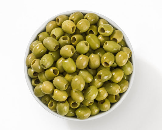 Olive Verdi Grecia Denocciolate in a bowl, ideal for stuffed olives, 5 kg product from Greece.