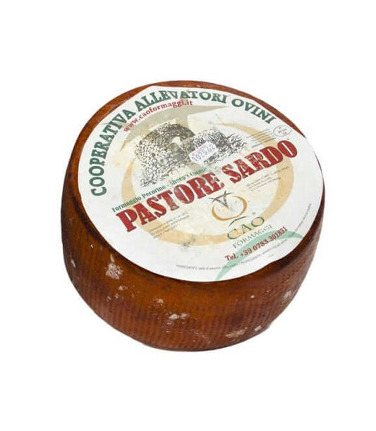 Pecorino del Pastore Sardo cheese wheel with a smooth brown rind and characteristic label.