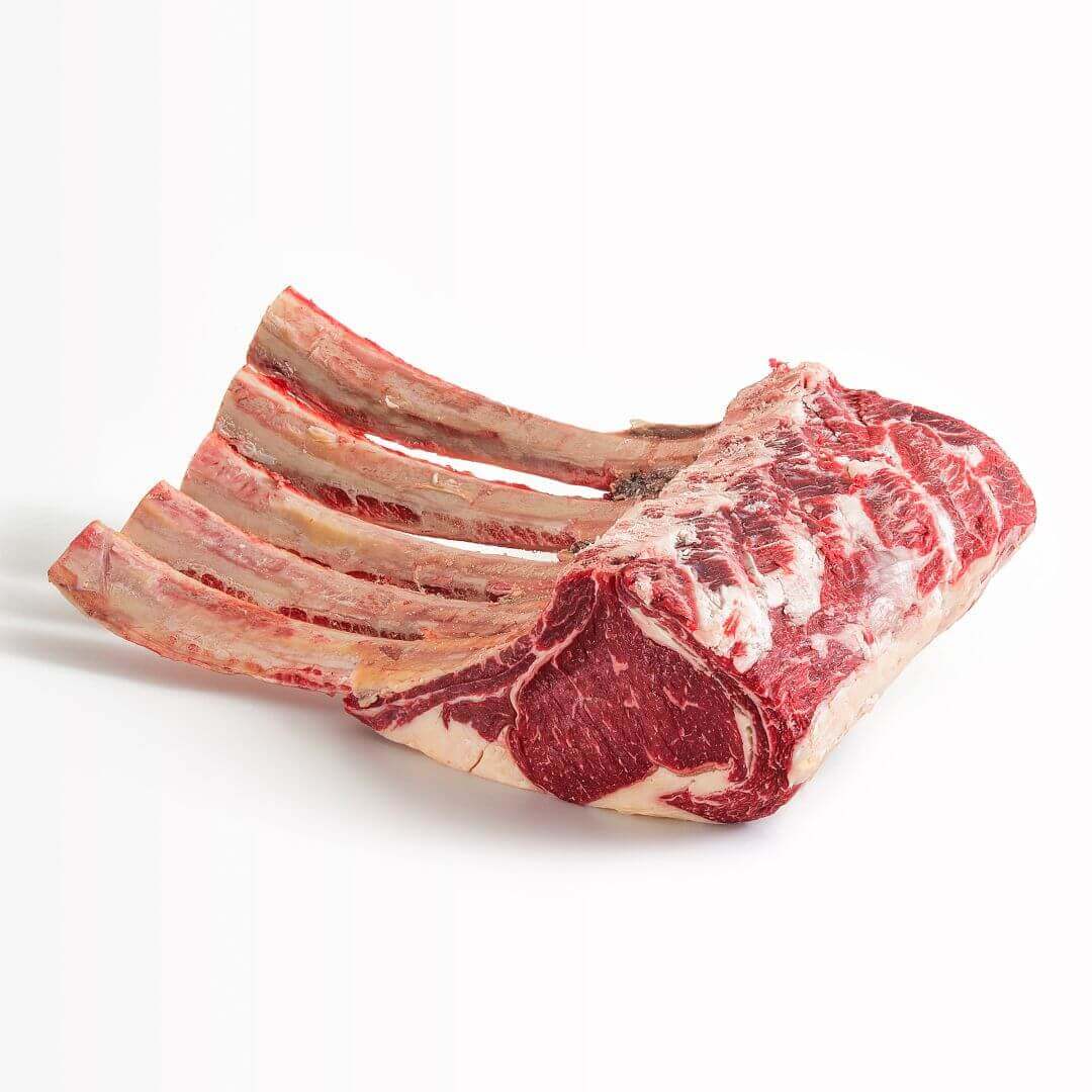 Tomahawk di Scottona Polacca, pacchetto da 6 kg con 5 bistecche sottovuoto, carne succulenta con marezzatura e grasso perfetti.
