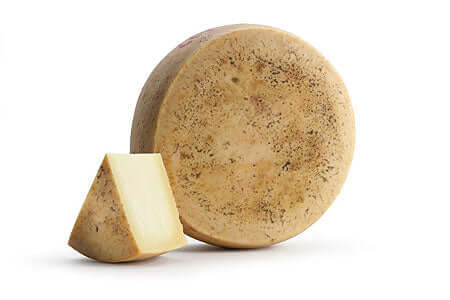 Tumazzo Modicano formaggio di latte vaccino stagionato 12 mesi, con aroma e sapore piccante.