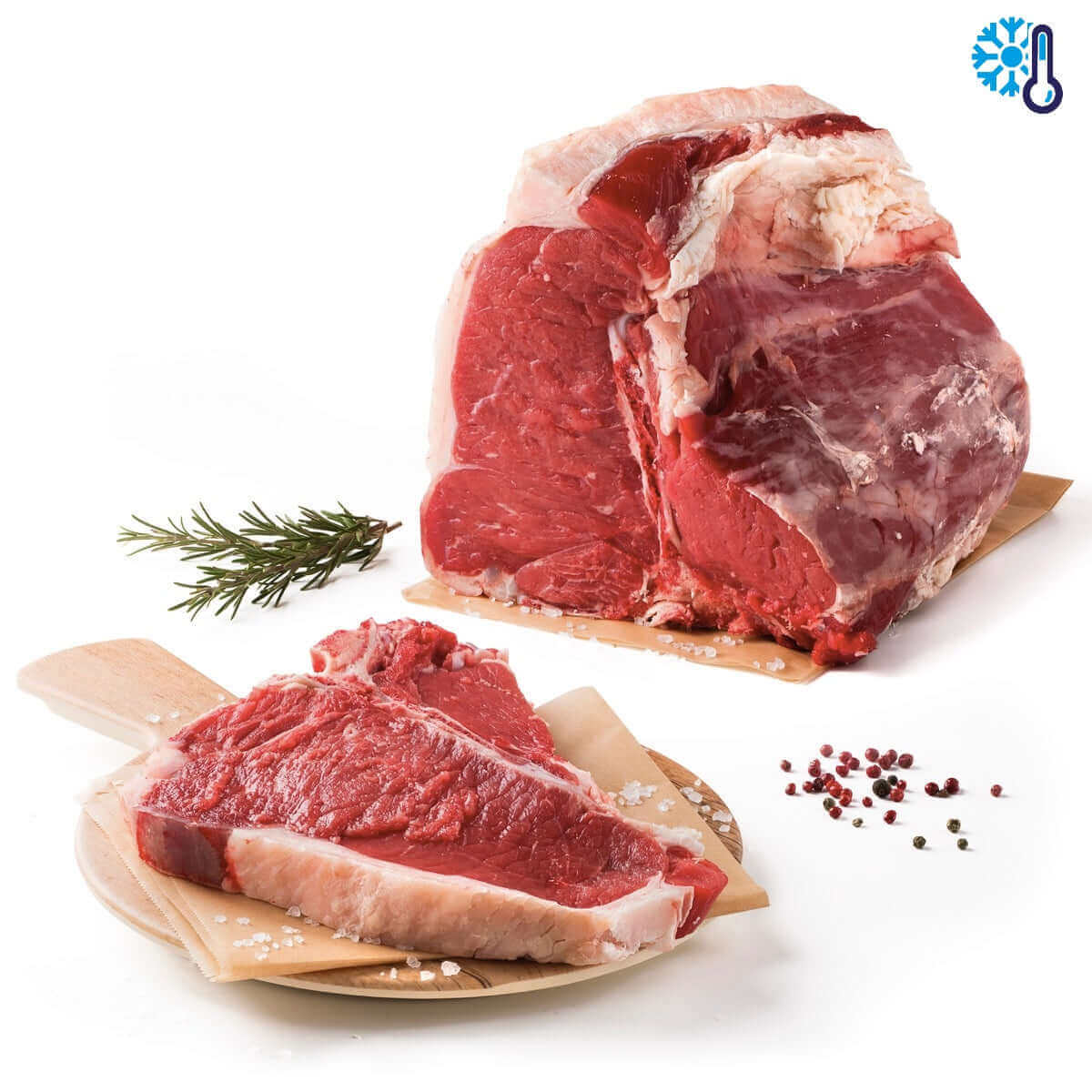 Fiorentina di Vitello Podolico Semibrado fresh meat cut with herbs and spices on wooden platter.