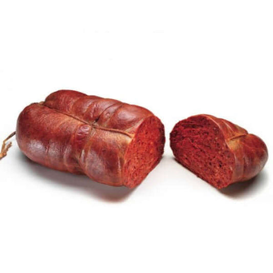 Nduja di Spilinga whole and sliced showing vibrant red color and artisanal casing, 2 kg curing without preservatives.