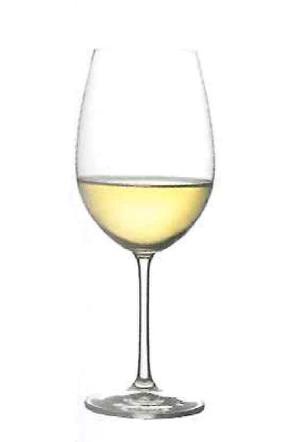 Vino Rosso Calabrese in a wine glass, showcasing its beautiful color and clarity.