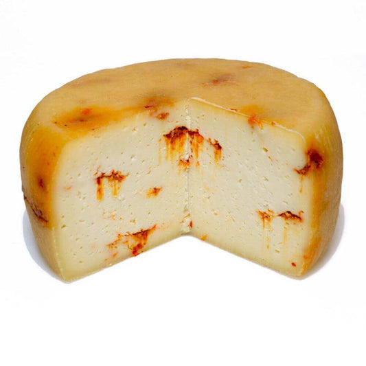 Zeus - Formaggio alla Nduja 2 kg cut cheese showing spicy and tangy texture.