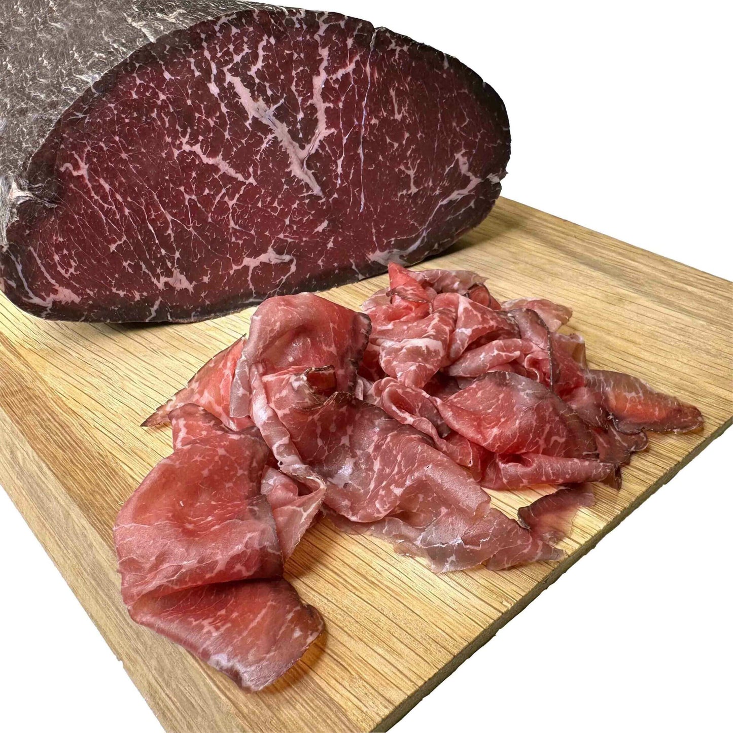Bresaola Angus Punta d'Anca on a wooden board, displaying sliced cured beef with marbled texture, a typical product from Valtellina.